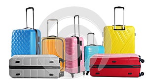 Set of different stylish suitcases for travelling on background