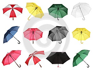 Set with different stylish umbrellas on white background
