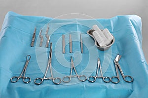 Set of different surgical instruments on table