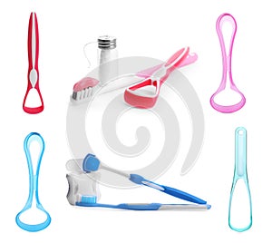 Set with different tongue scrapers, dental floss and toothbrushes on white background