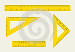 Set of different type of ruler, yellow ruler with measure in centimeters, inches and millimeters