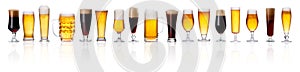 Set of different types of beer with foam in glasses isolated on