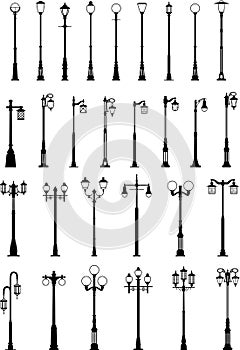 Set of different types of black silhouettes street lamps isolated on white background in flat style. Vector illustration.