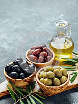 Set of different types olives and olive oil