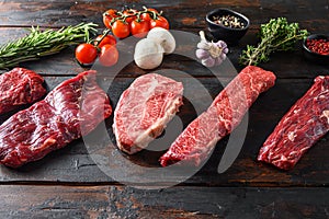 A set of different types of raw beef steaks alternative cut flap flank Steak, machete steak or skirt cut, Top blade or flat iron