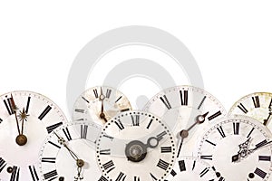 Set of different vintage clocks isolated on white