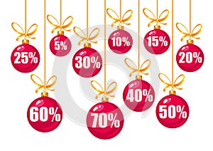 Set of discount tags 10,15,20,25,30,40,50,60,70 percent off in the shape of red Christmas balls hanging on a golden