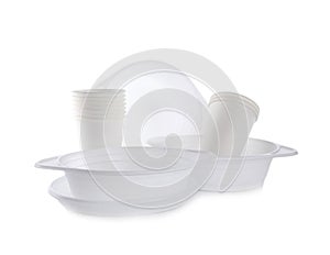 Set of disposable plastic dishware isolated