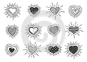 Set of doodle decorated heart shaped symbols with retro styled sun rays. Collection of different hand drawn romantic