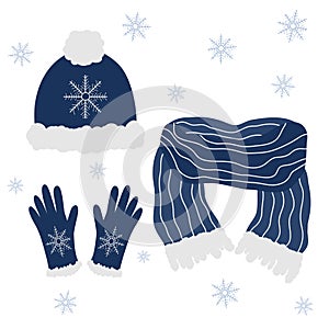 Set of doodle winter clothes. Dark blue hat, glove and scarf with light fur and snowflakes. Isolated.