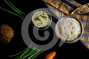 Set dosa along with vegetable stew on a dark background
