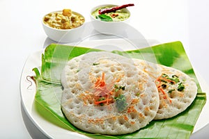 Set dosa with curry and chutney.