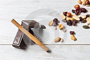 Set of dried fruits and coconut with wood background