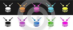 Set Drum with drum sticks icon isolated on black and white background. Music sign. Musical instrument symbol. Vector