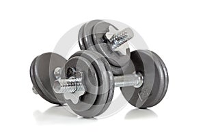 Set of dumbells on white photo