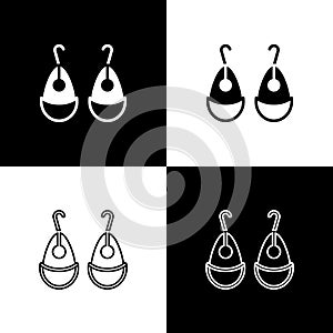 Set Earrings icon isolated on black and white background. Jewelry accessories. Vector