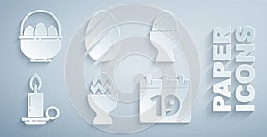 Set Easter egg on a stand, Burning candle in candlestick, Calendar with Happy, and Basket easter eggs icon. Vector