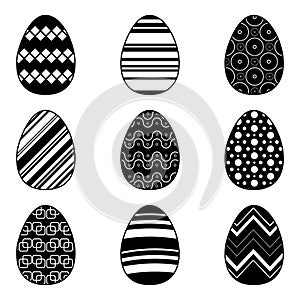 Set Easter eggs with different pattern on white background. Black icons collection for your design
