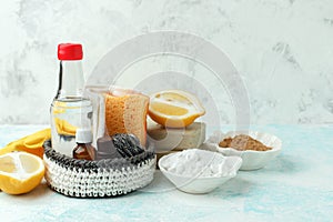 Set of eco-friendly natural cleaning products,metal brush, lemon, baking soda sodium bicarbonate, soap, essential oils, rags,