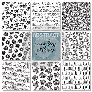 Set of eight hand drawn ink seamless patterns.