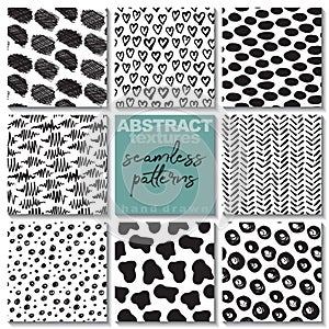 Set of eight hand drawn ink seamless patterns.