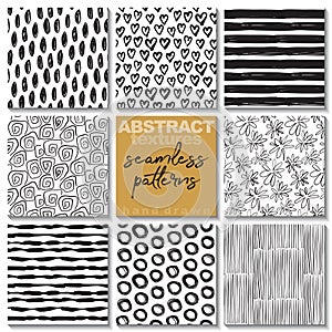 Set of eight hand drawn ink seamless patterns.