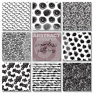 Set of eight hand drawn ink seamless patterns.