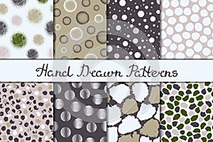 Set of eight seamless textures. Patterns with spheres, round and oval elements and spots. Abstract forms drawn a wide pen and ink.