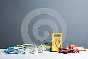 Set of electrician`s tools on table