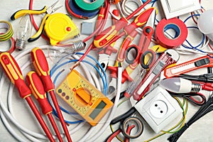 Set of electrician`s tools on table