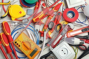 Set of electrician`s tools on table