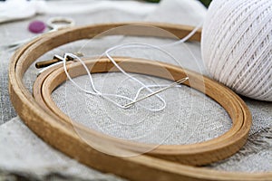 Set for embroidery, garment needle and embroidery hoop