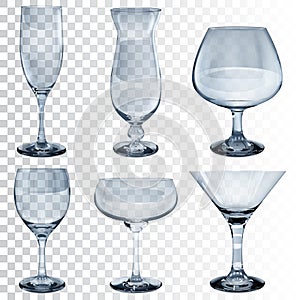 Set of empty transparent glass goblets for different drinks