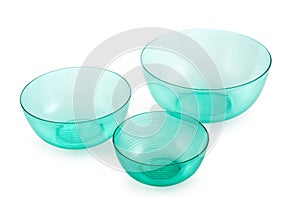 Set empty transparent turquoise plastic bowl isolated