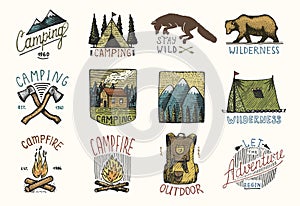 Set of engraved vintage, hand drawn, old, labels or badges for camping, hiking, hunting with mountains, campfire and