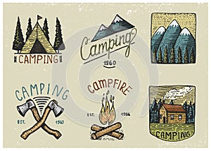 Set of engraved vintage, hand drawn, old, labels or badges for camping, hiking, hunting with tent, axe and campfire with