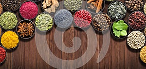 Set  European seasonings on  wooden table. Background of spices and herbs for food labels