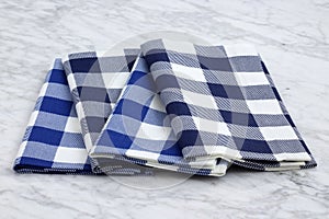 Set of fabric napkins on marble countertop