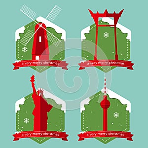 Set of famous world landmark buildings icons with Christmas badge in flat design .