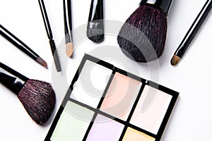 Set of female cosmetics on a white background