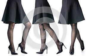 Set female legs in black high heels shoes black skirt fashion