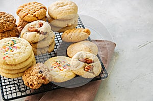 Set of festive cookies on a wire rack. Peanut butter, pecan, oat
