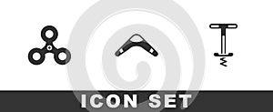 Set Fidget spinner, Boomerang and Pogo stick jumping toy icon. Vector