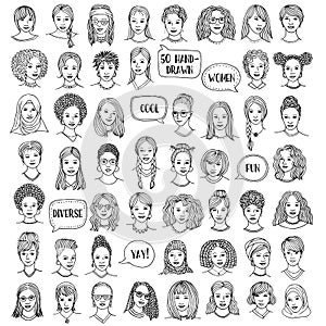 Set of fifty hand drawn female faces photo