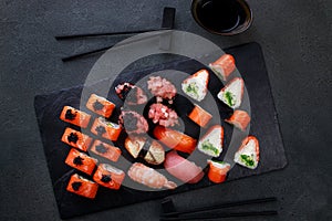 Set of finest sushi rolls on slate. Japanese food