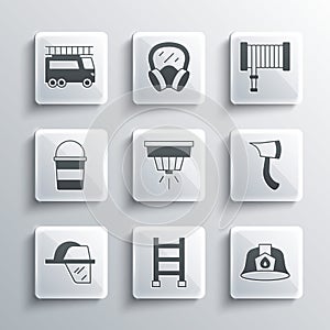 Set Fire escape, Firefighter helmet, axe, Smoke alarm system, bucket, truck and hose reel icon. Vector