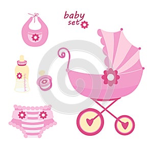 Set the first things a newborn baby on a white background.The stroller,bottle of milk,pacifier,bib,diaper