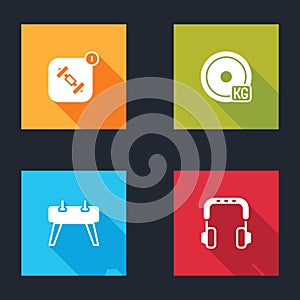 Set Fitness app, Weight plate, Pommel horse and Headphones icon. Vector