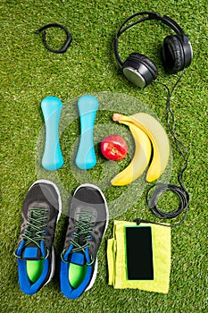 Set for fitness and sports nutrition, against the background of grass