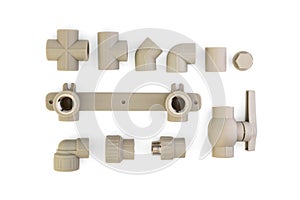 Set of fittings for polypropylene pipes on white background.